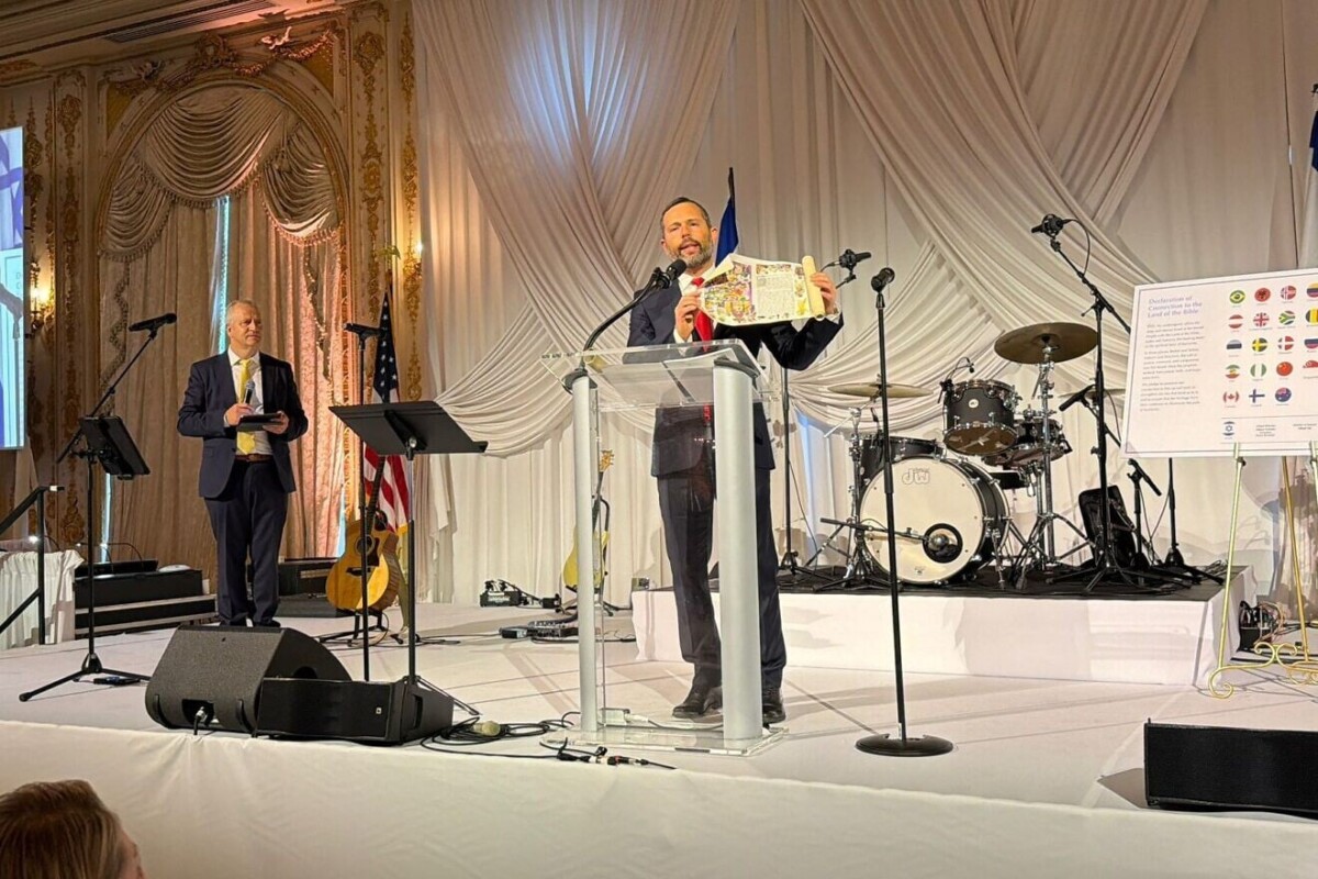Yisrael Ganz, Binyamin Regional Council governor and chairman of the Yesha Council, presenting a Scroll of Esther